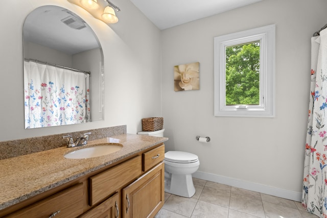 full bathroom featuring vanity, baseboards, toilet, tile patterned flooring, and curtained shower