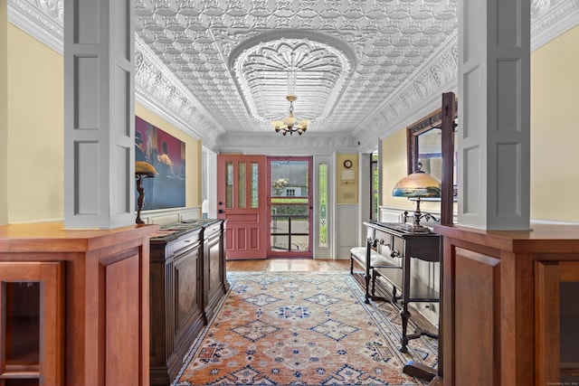 5 Oakwood Rd, Old Saybrook, CT 06475 - bar area with a chandelier, a decorative wall, and a wainscoted wall