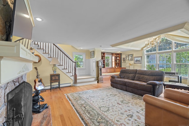 5 Oakwood Rd, Old Saybrook, CT 06475 - living room with stairway, light wood finished floors, plenty of natural light, ornamental molding, and recessed lighting