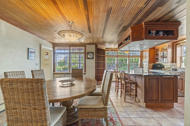 5 Oakwood Rd, Old Saybrook, CT 06475 - dining space featuring wood ceiling and light tile patterned floors