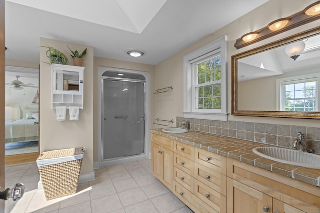 5 Oakwood Rd, Old Saybrook, CT 06475 - full bathroom featuring healthy amount of natural light, tile patterned floors, and a shower stall