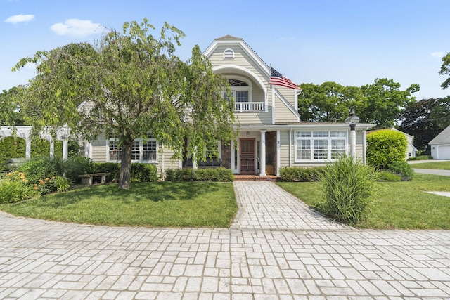 5 Oakwood Rd, Old Saybrook, CT 06475 - view of front of home featuring a front lawn and a porch