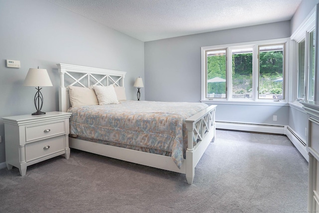 70R Tri Mountain Rd, Durham, CT 06422 - bedroom with carpet floors, a textured ceiling, and baseboard heating