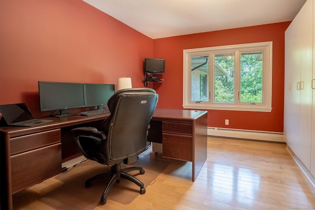 70R Tri Mountain Rd, Durham, CT 06422 - office area featuring baseboard heating, light wood-style flooring, and baseboards