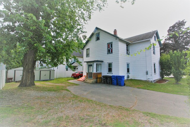 72 Brooker St, Torrington, CT 06790 - back of property featuring a chimney
