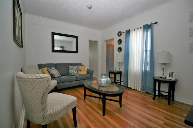 72 Brooker St, Torrington, CT 06790 - living area featuring ornamental molding and light wood finished floors