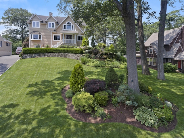 42 Woodledge Rd, Stamford, CT 06907 - view of front of house featuring a front lawn and a chimney