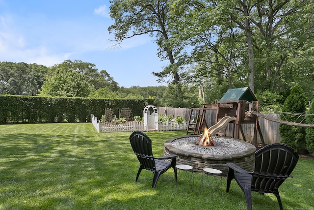 42 Woodledge Rd, Stamford, CT 06907 - view of yard featuring a playground and a fire pit