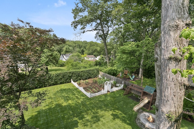 42 Woodledge Rd, Stamford, CT 06907 - view of yard with a playground and a garden