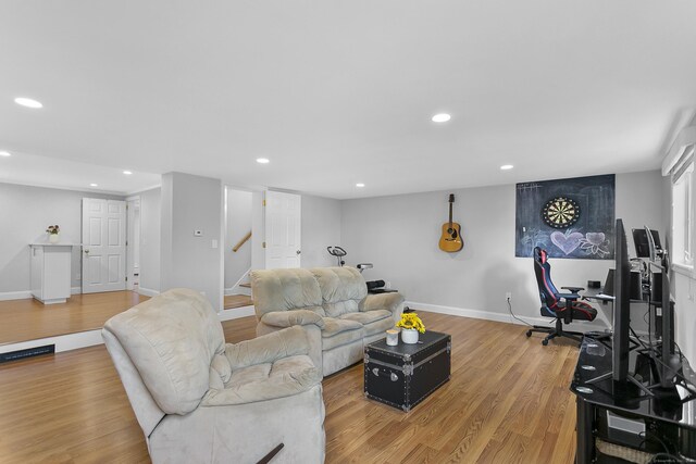 42 Woodledge Rd, Stamford, CT 06907 - living area featuring recessed lighting, light wood-style floors, and stairway