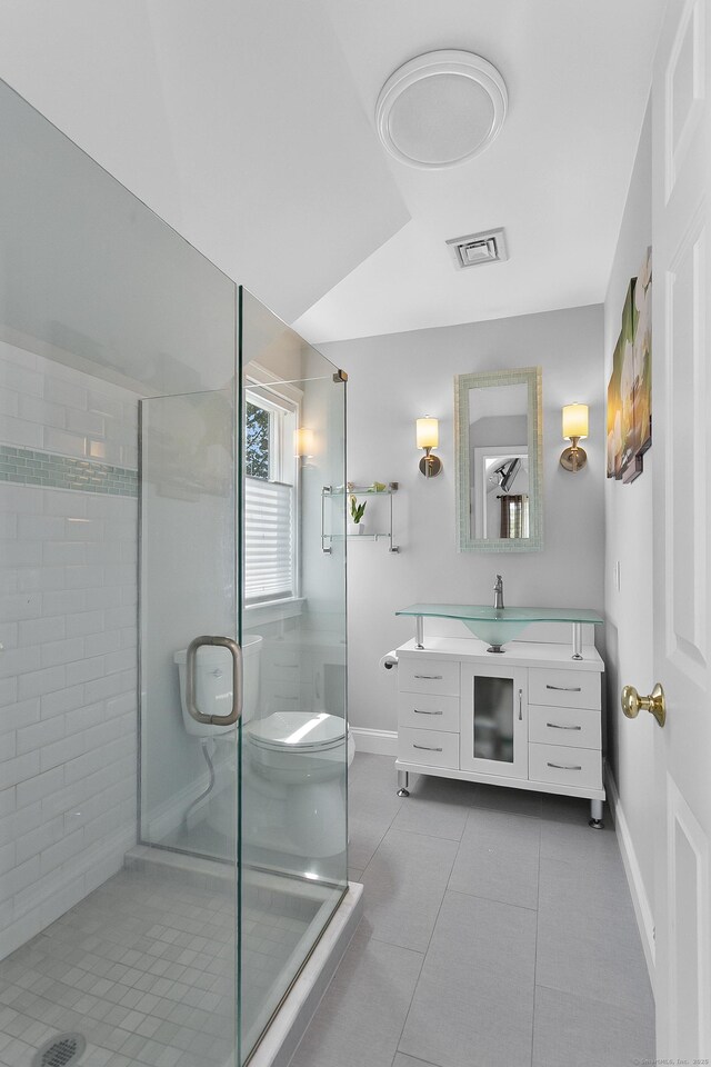 42 Woodledge Rd, Stamford, CT 06907 - bathroom featuring tile patterned floors, vanity, and a shower stall
