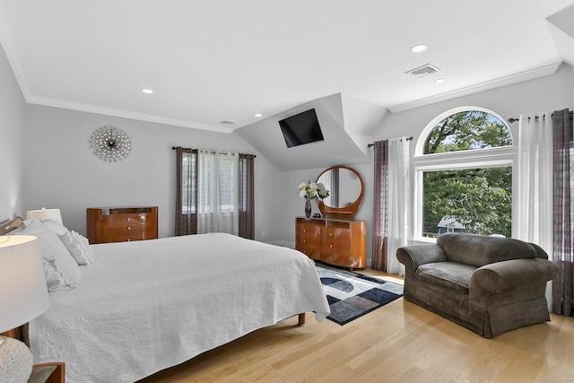 42 Woodledge Rd, Stamford, CT 06907 - bedroom with multiple windows, wood finished floors, ornamental molding, recessed lighting, and lofted ceiling