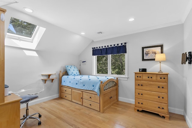 42 Woodledge Rd, Stamford, CT 06907 - bedroom featuring light wood-style floors, a skylight, recessed lighting, vaulted ceiling, and crown molding