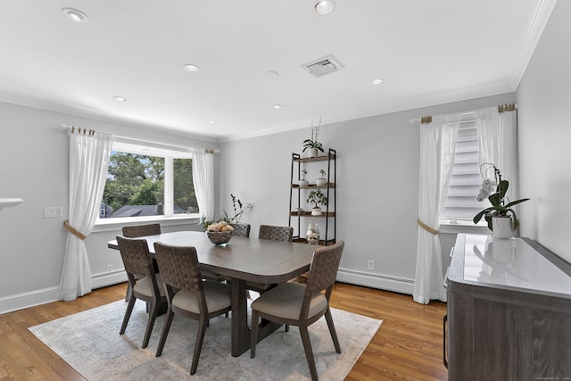 42 Woodledge Rd, Stamford, CT 06907 - dining room featuring crown molding, baseboard heating, light wood-type flooring, and recessed lighting
