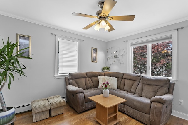 42 Woodledge Rd, Stamford, CT 06907 - living area featuring a baseboard radiator, a ceiling fan, crown molding, and light wood-style flooring