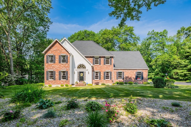 87 Falcon Crest Rd, Middlebury, CT 06762 - view of front of property with brick siding and a front yard