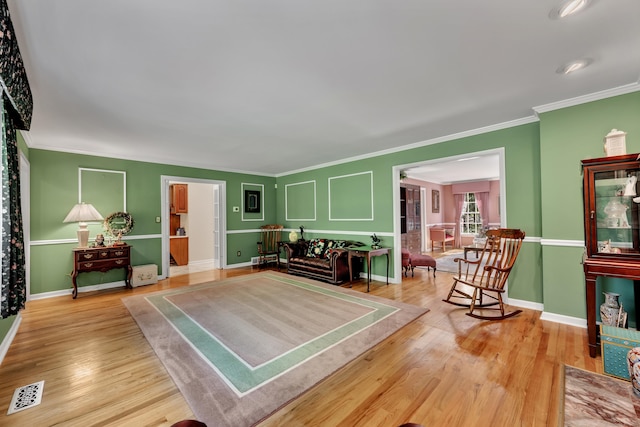 87 Falcon Crest Rd, Middlebury, CT 06762 - living room featuring wood finished floors and ornamental molding