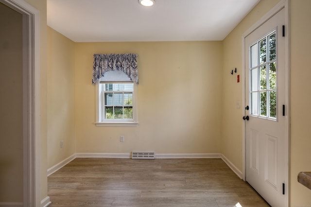 36 State St, Guilford, CT 06437 - entryway featuring healthy amount of natural light, light wood-type flooring, baseboards, and recessed lighting