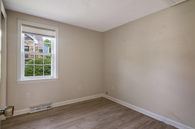36 State St, Guilford, CT 06437 - spare room with wood finished floors and baseboards