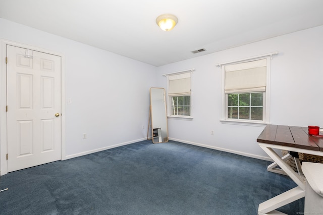 3580 Phelps Rd, Suffield, CT 06093 - spare room featuring dark carpet and baseboards