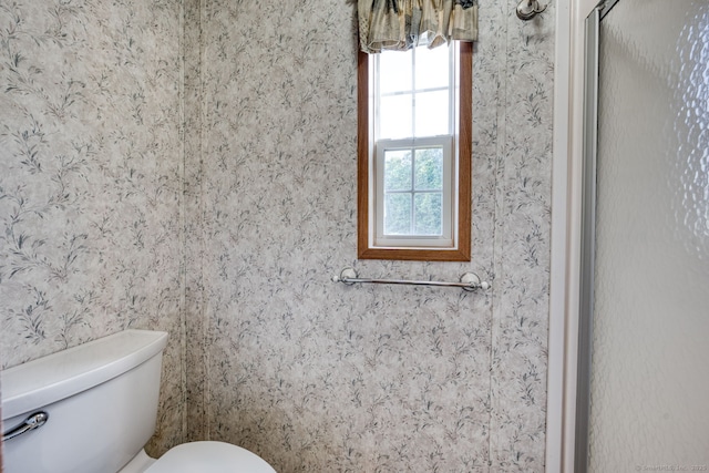 107 Lions Way, Windham, CT 06256 - bathroom with healthy amount of natural light, toilet, and wallpapered walls