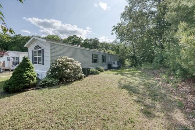 107 Lions Way, Windham, CT 06256 - view of green lawn with central air condition unit