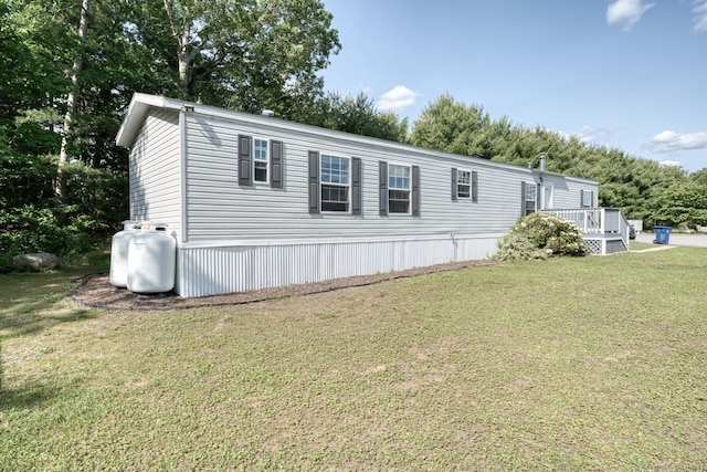 107 Lions Way, Windham, CT 06256 - view of home's exterior featuring a yard