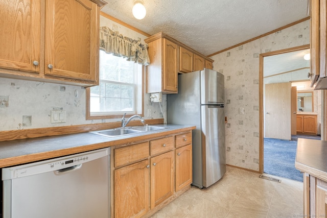 107 Lions Way, Windham, CT 06256 - kitchen featuring dishwashing machine, crown molding, a sink, wallpapered walls, and freestanding refrigerator