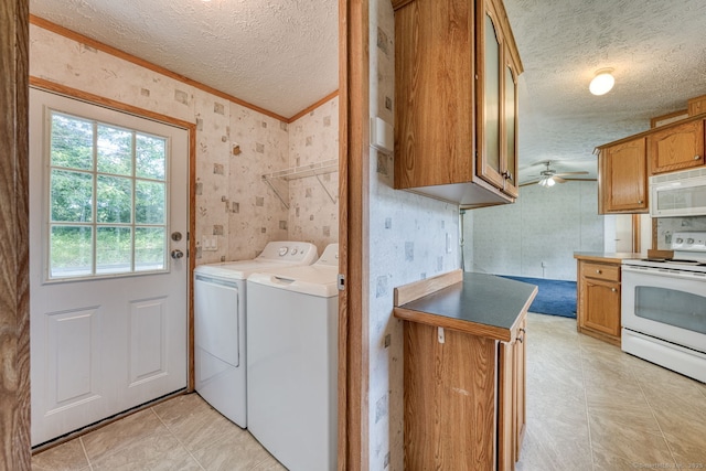 107 Lions Way, Windham, CT 06256 - laundry room with a textured ceiling, washing machine and dryer, crown molding, wallpapered walls, and ceiling fan