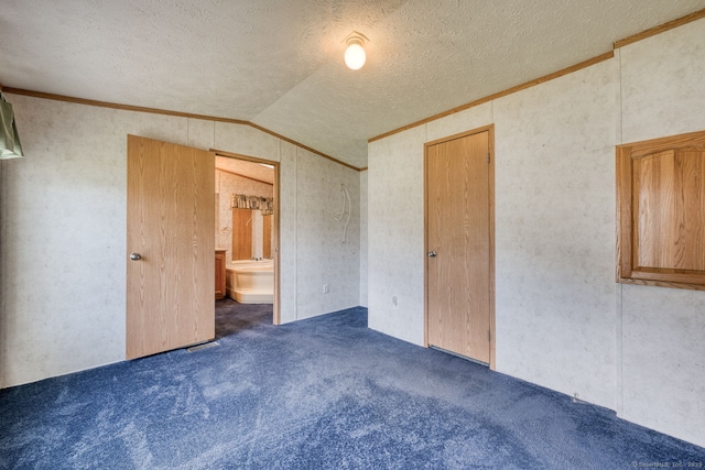 107 Lions Way, Windham, CT 06256 - unfurnished bedroom with lofted ceiling, carpet floors, crown molding, a textured ceiling, and connected bathroom