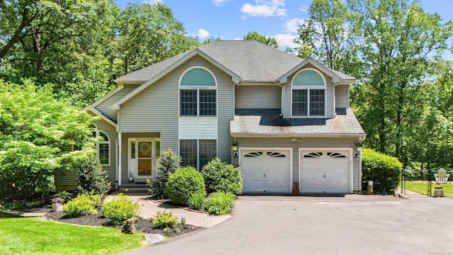 17 Raven Crest Dr, Bethel, CT 06801 - traditional home with asphalt driveway, a garage, and a shingled roof