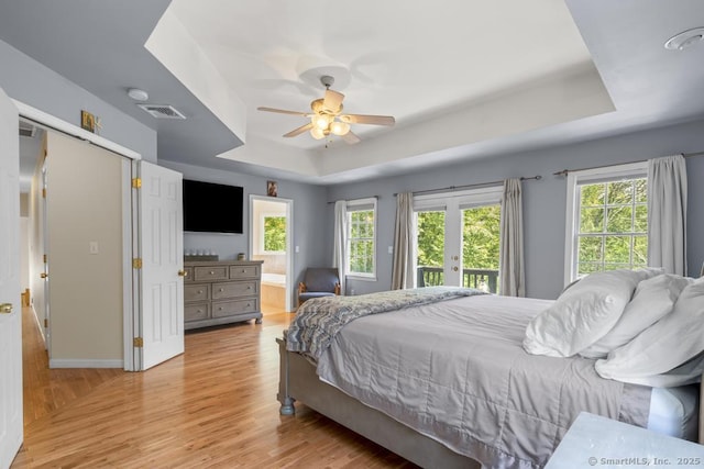 17 Raven Crest Dr, Bethel, CT 06801 - bedroom with a raised ceiling, access to outside, light wood-style floors, baseboards, and a ceiling fan