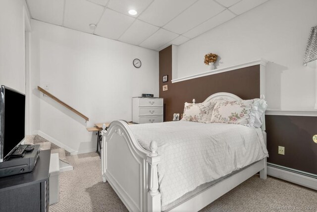 17 Raven Crest Dr, Bethel, CT 06801 - carpeted bedroom featuring baseboard heating, a paneled ceiling, and baseboards