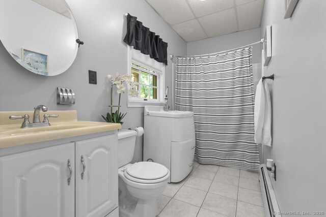 17 Raven Crest Dr, Bethel, CT 06801 - full bath featuring a baseboard heating unit, toilet, tile patterned flooring, vanity, and a paneled ceiling