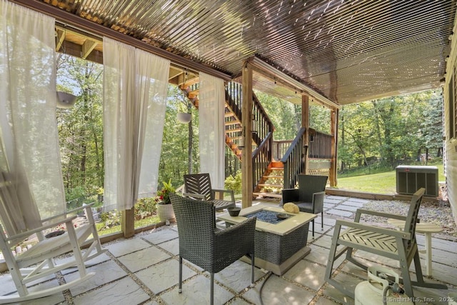 17 Raven Crest Dr, Bethel, CT 06801 - view of patio featuring stairway, central AC, and a fire pit