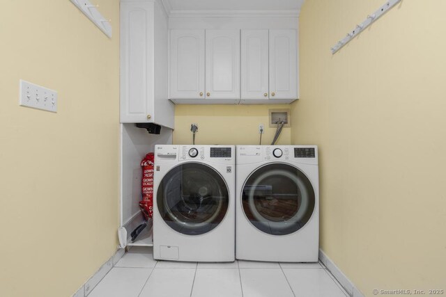 17 Raven Crest Dr, Bethel, CT 06801 - washroom with cabinet space, independent washer and dryer, baseboards, and light tile patterned floors