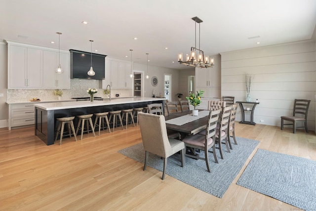 300 Hollow Tree Ridge Rd, Darien, CT 06820 - dining space featuring light wood-style floors, a chandelier, and recessed lighting