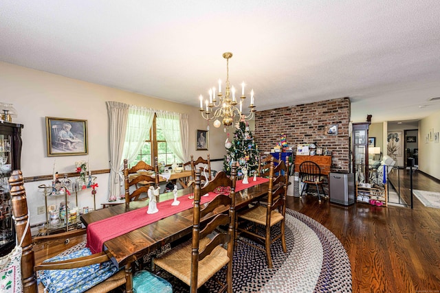 34 Cedar Rock Rd, Woodbridge, CT 06525 - dining space featuring a chandelier and wood finished floors