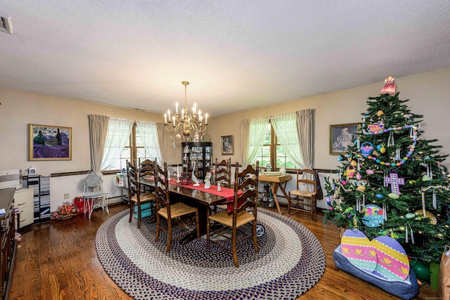 34 Cedar Rock Rd, Woodbridge, CT 06525 - dining room with a chandelier, wood finished floors, plenty of natural light, and a textured ceiling