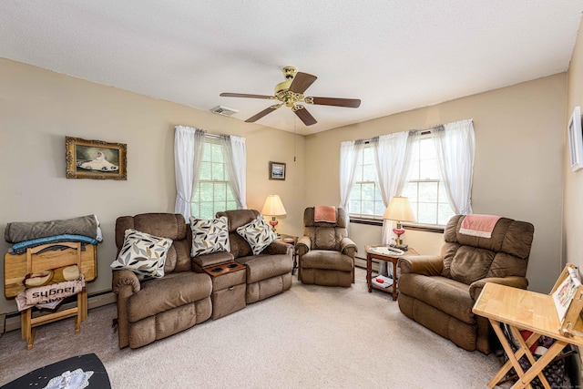 34 Cedar Rock Rd, Woodbridge, CT 06525 - carpeted living area with plenty of natural light, ceiling fan, and baseboard heating