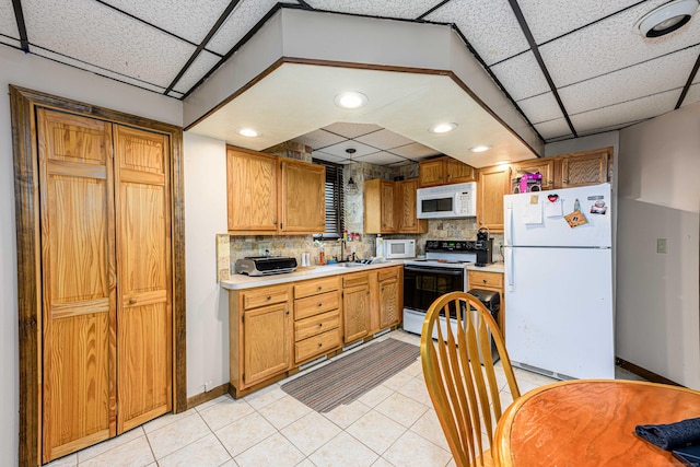 34 Cedar Rock Rd, Woodbridge, CT 06525 - kitchen with white appliances, light countertops, light tile patterned floors, a paneled ceiling, and baseboards
