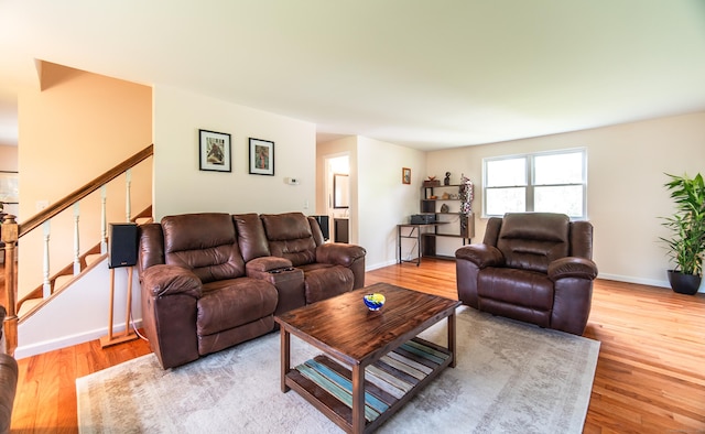 227 Thistle Ln, Southington, CT 06489 - living room with light wood-style flooring, stairway, and baseboards