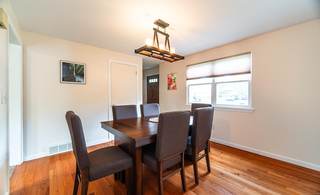 227 Thistle Ln, Southington, CT 06489 - dining room with light wood-style flooring and baseboards