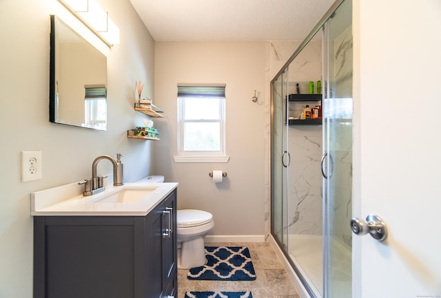 227 Thistle Ln, Southington, CT 06489 - bathroom with vanity, toilet, a marble finish shower, baseboards, and a textured ceiling