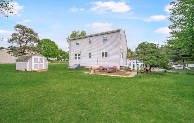 227 Thistle Ln, Southington, CT 06489 - back of house featuring a yard and a patio