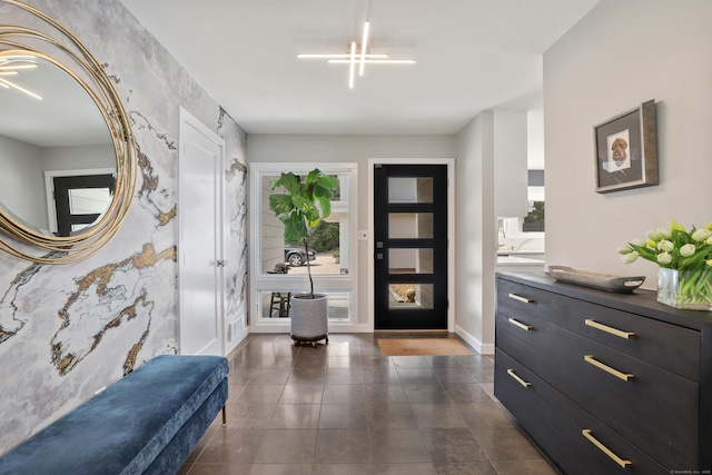 99 High Ridge Rd, Pound Ridge, NY 10576 - foyer entrance featuring baseboards, dark tile patterned flooring, and wallpapered walls