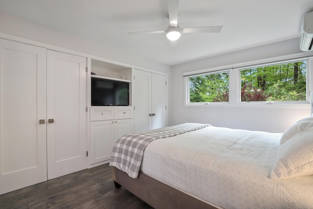 99 High Ridge Rd, Pound Ridge, NY 10576 - bedroom featuring dark wood finished floors, multiple closets, a ceiling fan, and an AC wall unit