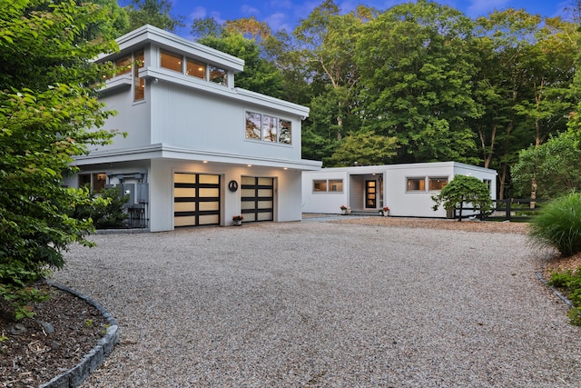99 High Ridge Rd, Pound Ridge, NY 10576 - modern home with driveway and an attached garage