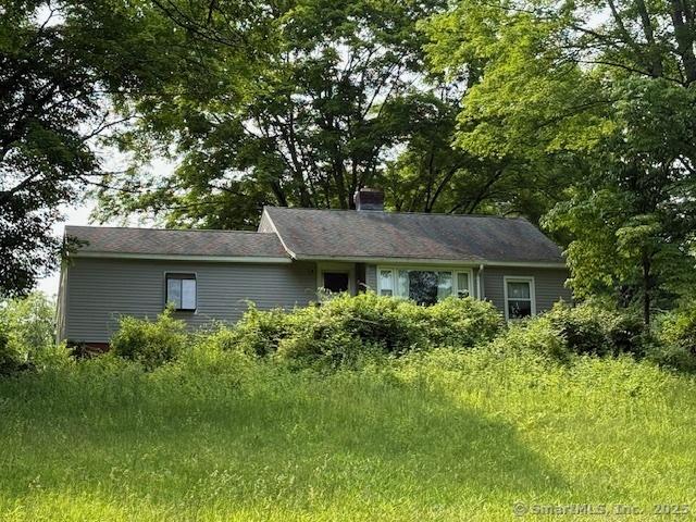 789 Tuttle Ave, Hamden, CT 06518 - view of front of home featuring a chimney