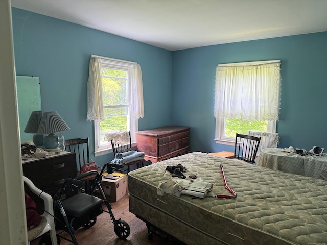 789 Tuttle Ave, Hamden, CT 06518 - bedroom with wood finished floors and multiple windows